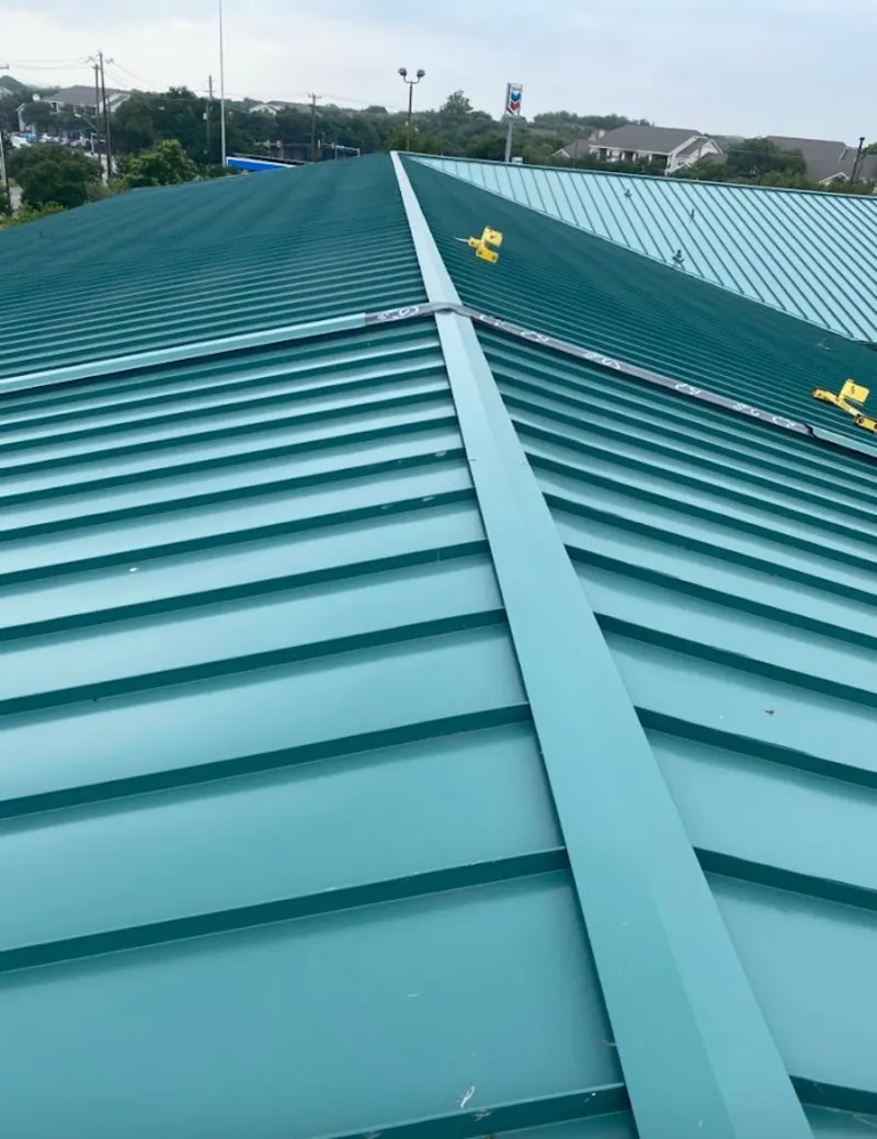 Green commercial metal roof ridge and valley for Metal Roof Repair in Clyde